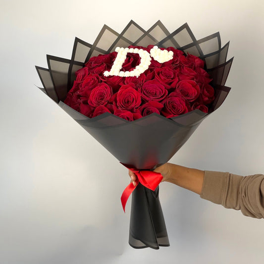 Bouquet of roses with initial letter